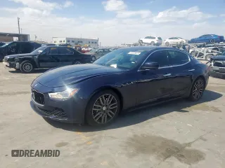 2015 Maserati Ghibli with VIN ZAM57XSA9F1162207, listed as a Copart auction lot 46978825 with 136,064 mi miles and Salvage Title. Bid and sale history available at carsss.com. Image 1.
