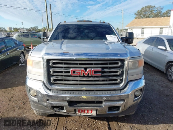 2015 GMC Sierra 2500HD available WiFi SLT with VIN 1GT12ZEG7FF167096, listed as a IAAI auction lot 41408317 with 152,969 mi miles. Bid and sale history available at carsss.com. Image 12.