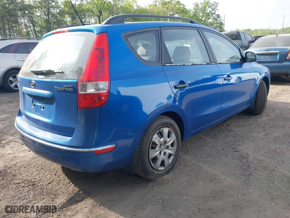2010 Hyundai Elantra Touring SE with VIN KMHDC8AE0AU052512, listed as a IAAI auction lot 42123818 with 243,070 mi miles. Bid and sale history available at carsss.com. Image 4.