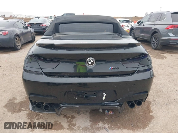 2014 BMW M6 z VIN WBSLZ9C58ED651156, wystawiony jako IAAI lot #41526192 z przebiegiem 90 642 mil mil oraz . Historia ofert i sprzedaży dostępna na DreamBid. Obrazek 16.