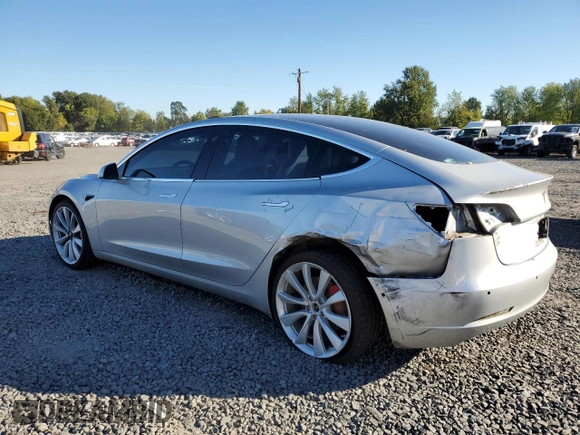 2018 Tesla Model 3 Long Range Battery with VIN 5YJ3E1EB4JF074295, listed as a Copart auction lot 74775384 with 83,515 mi miles and Salvage Title. Bid and sale history available at DreamBid. Image 2.