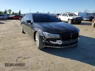 2016 BMW 7 Series 740i with VIN WBA7E2C54GG547404, listed as a Copart auction lot 40052803 with 94,008 mi miles. Bid and sale history available at carsss.com. Image 10.