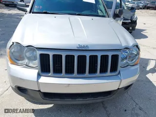 2010 Jeep Grand Cherokee Laredo with VIN 1J4PS4GK3AC163307, listed as a IAAI auction lot 41681527 with 155,464 mi miles. Bid and sale history available at carsss.com. Image 6.