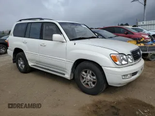 2002 Lexus LX 470 z VIN JTJHT00W423522126, wystawiony jako Copart lot #56582855 z przebiegiem 280 679 mil mil oraz Szkoda całkowita • Salvage title. Historia ofert i sprzedaży dostępna na DreamBid. Obrazek 4.