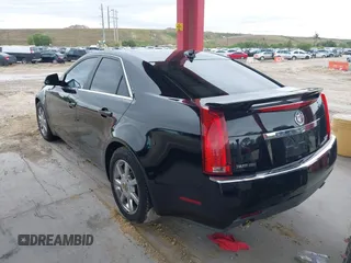 2009 Cadillac CTS RWD w/1SB with VIN 1G6DU57V290147277, listed as a IAAI auction lot 41995209 with 120,576 mi miles. Bid and sale history available at carsss.com. Image 3.