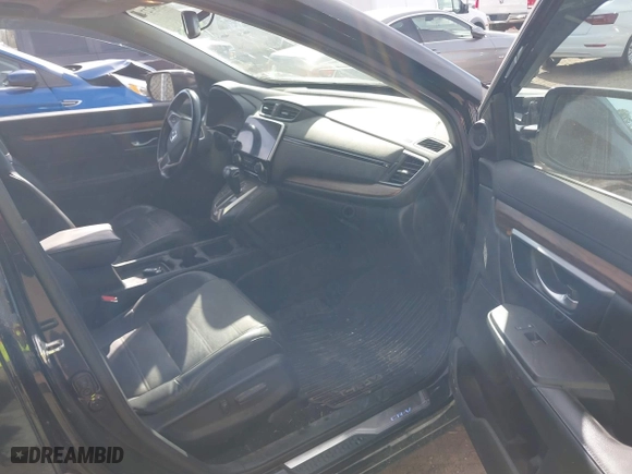 2017 Honda CR-V Touring with VIN 5J6RW2H96HL037854, listed as a IAAI auction lot 40472748 with 126,582 mi miles. Bid and sale history available at carsss.com. Image 5.