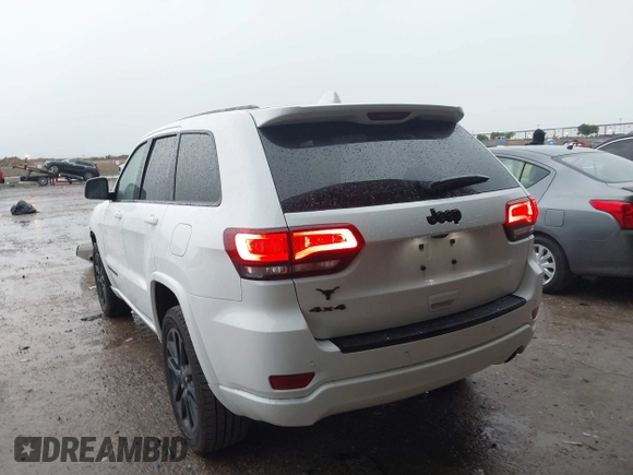 2018 Jeep Grand Cherokee Altitude with VIN 1C4RJFAG4JC320599, listed as a IAAI auction lot 42182661 with 70,957 mi miles and . Bid and sale history available at DreamBid. Image 3.