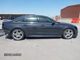 2016 Audi A6 3.0T Premium Plus with VIN WAUFGAFC0GN093898, listed as a IAAI auction lot 41844371 with 71,189 mi miles. Bid and sale history available at carsss.com. Image 14.