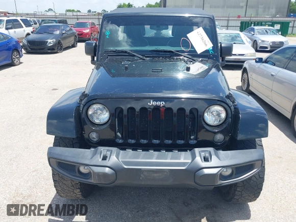 2015 Jeep Wrangler Unlimited Sahara with VIN 1C4HJWEG6FL572674, listed as a IAAI auction lot 42736266 with 97,024 mi miles and . Bid and sale history available at DreamBid. Image 12.