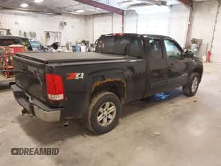 2009 GMC Sierra 1500 SLE with VIN 1GTEK29029Z297795, listed as a IAAI auction lot 41980874 with 231,268 mi miles. Bid and sale history available at carsss.com. Image 4.