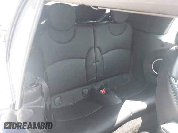 2013 MINI Convertible S with VIN WMWZP3C5XDT705613, listed as a IAAI auction lot 42392748 with 87,477 mi miles and . Bid and sale history available at DreamBid. Image 8.