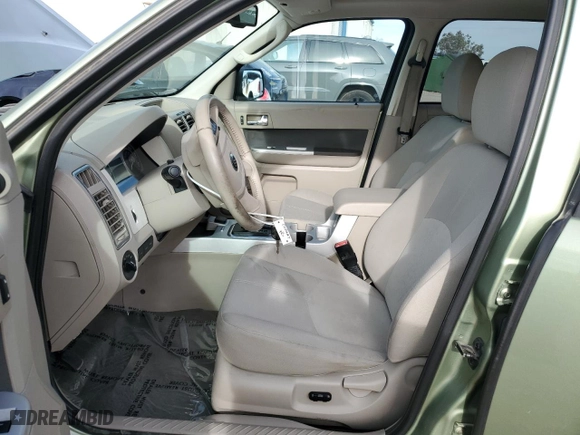 2009 Mercury Mariner Hybrid with VIN 4M2CU29389KJ09618, listed as a Copart auction lot 51431185 with 137,881 mi miles and Clean Title. Bid and sale history available at carsss.com. Image 7.