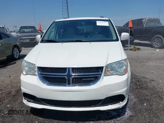 2012 Dodge Grand Caravan SXT with VIN 2C4RDGCG9CR200432, listed as a IAAI auction lot 42027477 with 99,076 mi miles and . Bid and sale history available at DreamBid. Image 12.