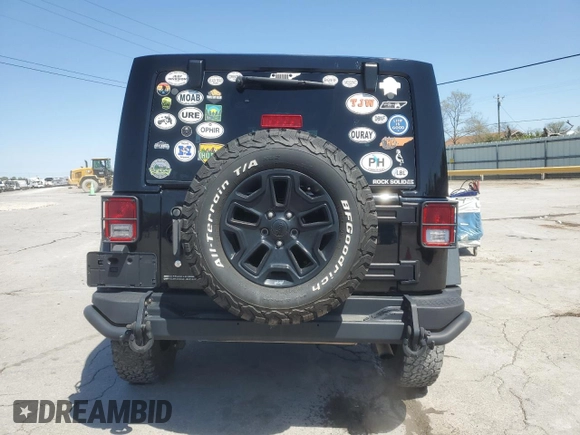 2013 Jeep Wrangler Sahara with VIN 1C4AJWBG8DL602065, listed as a Copart auction lot 52082535 with 110,727 mi miles and Salvage title. Bid and sale history available at DreamBid. Image 6.