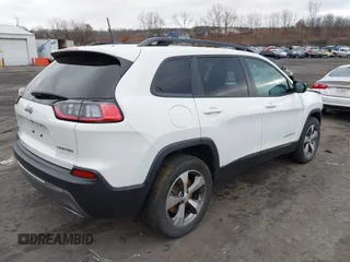 2022 Jeep Cherokee Limited with VIN 1C4PJMDX6ND550698, listed as a IAAI auction lot 41238598 with 18,006 mi miles and . Bid and sale history available at DreamBid. Image 4.