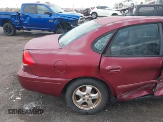 2004 Ford Taurus SES with VIN 1FAFP55284G188993, listed as a IAAI auction lot 41895733 with Not Provided miles and . Bid and sale history available at DreamBid. Image 18.