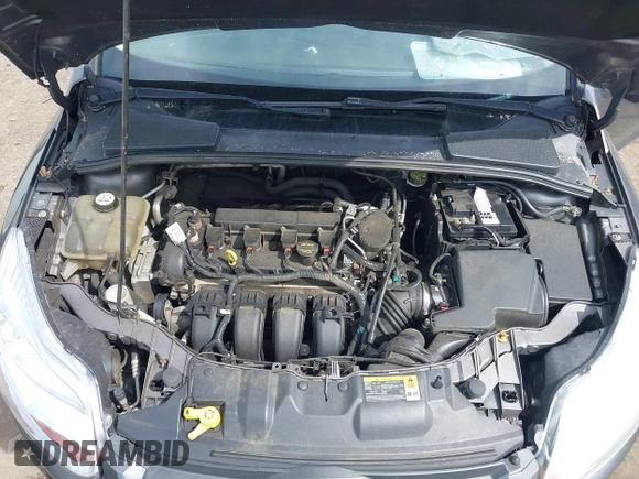 2013 Ford Focus SE z VIN 1FADP3F24DL104718, wystawiony jako IAAI lot #42206680 z przebiegiem Nie podano mil oraz . Historia ofert i sprzedaży dostępna na DreamBid. Obrazek 10.