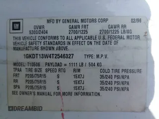 1996 GMC Jimmy SL with VIN 1GKDT13W4T2546327, listed as a IAAI auction lot 41966572 with 134,749 mi miles. Bid and sale history available at carsss.com. Image 9.