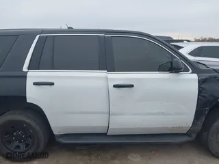2018 Chevrolet Tahoe Commercial with VIN 1GNLCDEC1JR312458, listed as a IAAI auction lot 41371563 with 114,086 mi miles. Bid and sale history available at carsss.com. Image 13.