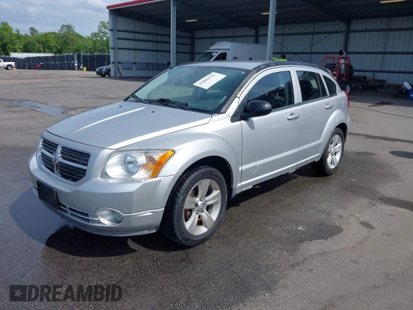 2011 Dodge Caliber Mainstreet with VIN 1B3CB3HA2BD179211, listed as a IAAI auction lot 42084745 with 136,276 mi miles. Bid and sale history available at carsss.com. Image 2.