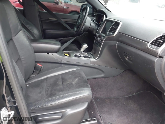 2018 Jeep Grand Cherokee Laredo E with VIN 1C4RJFAG7JC312948, listed as a IAAI auction lot 41624027 with 116,763 mi miles. Bid and sale history available at carsss.com. Image 5.