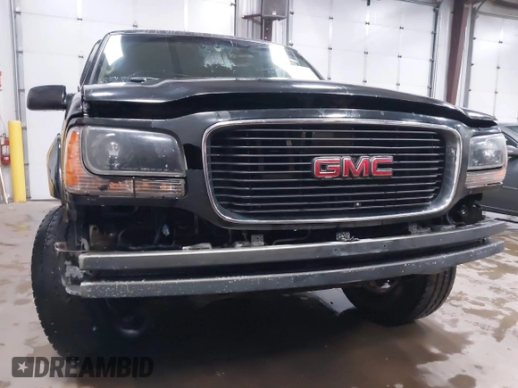 2000 GMC Denali with VIN 1GKEK13R9YR163824, listed as a IAAI auction lot 41245808 with 206,773 mi miles. Bid and sale history available at carsss.com. Image 6.