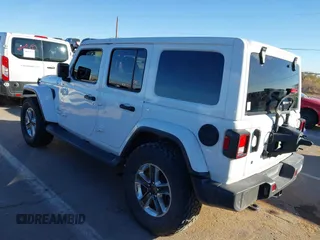 2019 Jeep Wrangler Unlimited Sahara с VIN 1C4HJXEN9KW509839, выставлен на аукционе IAAI как лот 41054085 с пробегом 78 850 миль миль и . История ставок и продаж доступна на DreamBid. Изображение 14.