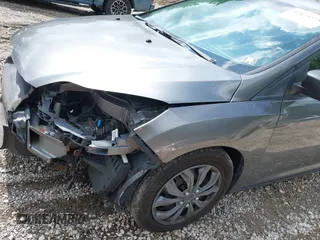 2012 Ford Focus SE with VIN 1FAHP3F29CL310052, listed as a IAAI auction lot 42671578 with 220,537 mi miles and . Bid and sale history available at DreamBid. Image 14.