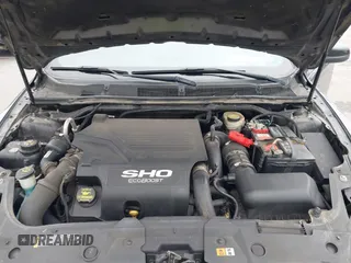 2013 Ford Taurus SHO с VIN 1FAHP2KT4DG164646, выставлен на аукционе IAAI как лот 42274365 с пробегом 225 482 миль миль и . История ставок и продаж доступна на DreamBid. Изображение 10.