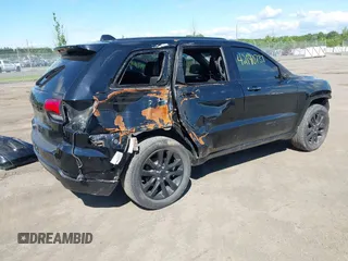 2018 Jeep Grand Cherokee Altitude with VIN 1C4RJFAG6JC147832, listed as a IAAI auction lot 42190737 with 104,280 mi miles and . Bid and sale history available at DreamBid. Image 4.