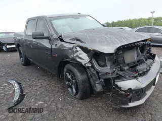 2021 Ram 1500 Tradesman z VIN 3C6RR6KT2MG704541, wystawiony jako IAAI lot #42234019 z przebiegiem 19 227 mil mil oraz . Historia ofert i sprzedaży dostępna na DreamBid. Obrazek 1.