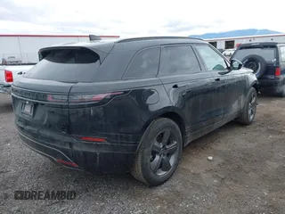 2025 Land Rover Range Rover Velar Dynamic SE z VIN SALYL2EX1SA397574, wystawiony jako IAAI lot #41707997 z przebiegiem 19 919 mil mil oraz . Historia ofert i sprzedaży dostępna na DreamBid. Obrazek 4.