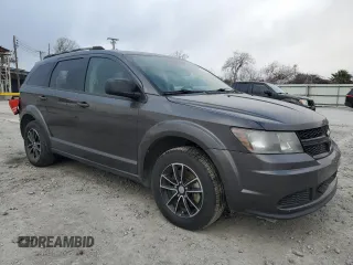 2017 Dodge Journey SE with VIN 3C4PDCAB2HT701139, listed as a Copart auction lot 43537005 with 76,530 mi miles and Salvage Title. Bid and sale history available at DreamBid. Image 4.