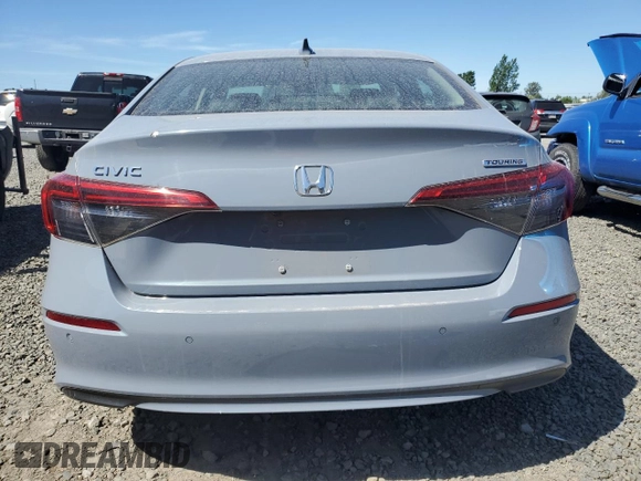 2022 Honda Civic Touring with VIN 2HGFE1F90NH319961, listed as a Copart auction lot 57799335 with 36,458 mi miles and Salvage title. Bid and sale history available at DreamBid. Image 6.