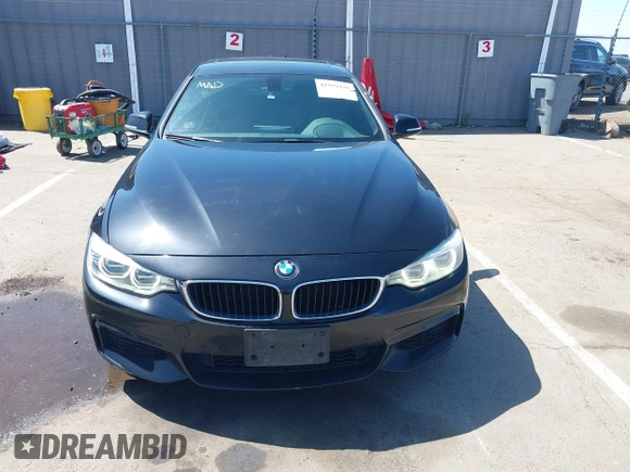 2015 BMW 4 Series 428i z VIN WBA4A9C52FGL86332, wystawiony jako IAAI lot #41970189 z przebiegiem 112 282 mil mil oraz . Historia ofert i sprzedaży dostępna na DreamBid. Obrazek 13.