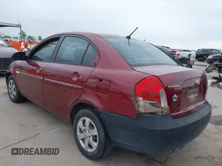 2007 Hyundai Accent GLS with VIN KMHCN46C57U108605, listed as a IAAI auction lot 41932061 with 195,580 mi miles. Bid and sale history available at carsss.com. Image 6.