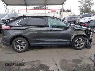 2020 Ford Edge SEL z VIN 2FMPK3J95LBA27779, wystawiony jako IAAI lot #42139536 z przebiegiem 58 285 mil mil oraz . Historia ofert i sprzedaży dostępna na DreamBid. Obrazek 14.