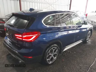 2019 BMW X1 xDrive28i z VIN WBXHT3C56K3H34720, wystawiony jako IAAI lot #42113497 z przebiegiem 64 906 mil mil oraz . Historia ofert i sprzedaży dostępna na DreamBid. Obrazek 4.
