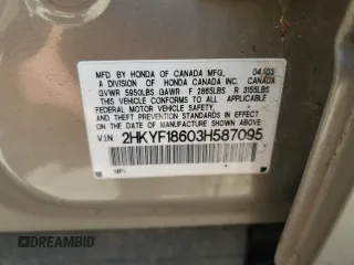 2003 Honda Pilot EX z VIN 2HKYF18603H587095, wystawiony jako Copart lot #53886125 z przebiegiem 188 388 mil mil oraz Szkoda całkowita • Salvage title. Historia ofert i sprzedaży dostępna na DreamBid. Obrazek 13.