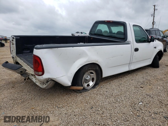 2001 Ford F-150 XL with VIN 3FTZF17201MA44310, listed as a Copart auction lot 73794104 with Not provided miles and Salvage title. Bid and sale history available at DreamBid. Image 3.