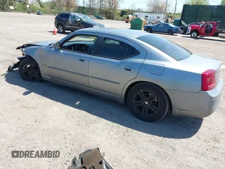 2006 Dodge Charger R/T with VIN 2B3KA53HX6H323577, listed as a IAAI auction lot 42128677 with 268,675 mi miles and . Bid and sale history available at carsss.com. Image 3.