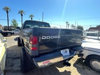 2001 Dodge Ram 1500 with VIN 1B7HC13Y11J562437, listed as a Copart auction lot 52826525 with 202,170 mi miles and Clean Title. Bid and sale history available at carsss.com. Image 3.