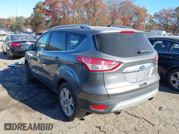 2014 Ford Escape Titanium with VIN 1FMCU9J94EUC50534, listed as a IAAI auction lot 41040341 with 115,502 mi miles. Bid and sale history available at carsss.com. Image 3.