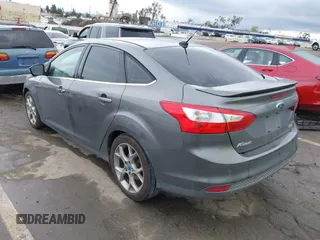 2013 Ford Focus Titanium with VIN 1FADP3J2XDL270393, listed as a IAAI auction lot 41814775 with 76,907 mi miles and . Bid and sale history available at carsss.com. Image 3.