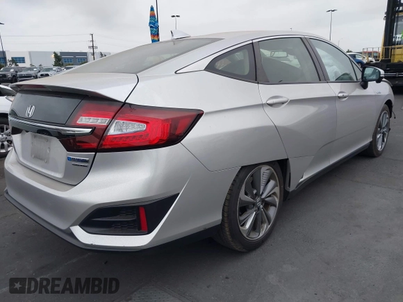 2018 Honda Clarity Touring with VIN JHMZC5F32JC014588, listed as a IAAI auction lot 42066633 with 89,316 mi miles. Bid and sale history available at carsss.com. Image 4.