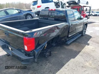 2018 Chevrolet Silverado 1500 with VIN 1GCVKSEC3JZ125571, listed as a IAAI auction lot 41982881 with 58,410 mi miles and . Bid and sale history available at DreamBid. Image 17.
