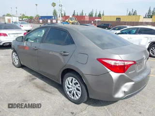 2018 Toyota Corolla L with VIN 5YFBURHE6JP774827, listed as a IAAI auction lot 42598086 with 29,400 mi miles and . Bid and sale history available at DreamBid. Image 3.
