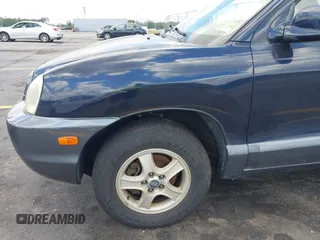 2004 Hyundai Santa Fe GLS with VIN KM8SC73D74U608244, listed as a IAAI auction lot 42142464 with 138,537 mi miles. Bid and sale history available at carsss.com. Image 6.