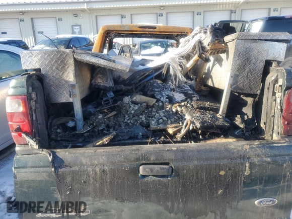 2002 Ford Ranger XL z VIN 1FTZR15E52TA65175, wystawiony jako Copart lot #87667585 z przebiegiem Nie podano mil oraz Szkoda całkowita • Salvage title. Historia ofert i sprzedaży dostępna na DreamBid. Obrazek 6.
