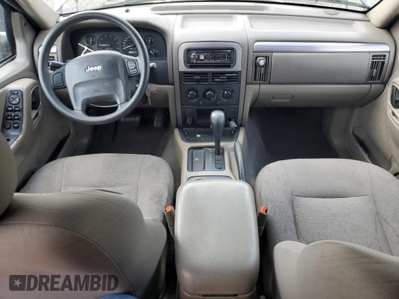 2004 Jeep Grand Cherokee Laredo with VIN 1J4GX48N94C397241, listed as a Copart auction lot 49183315 with 189,099 mi miles and Salvage title. Bid and sale history available at DreamBid. Image 8.